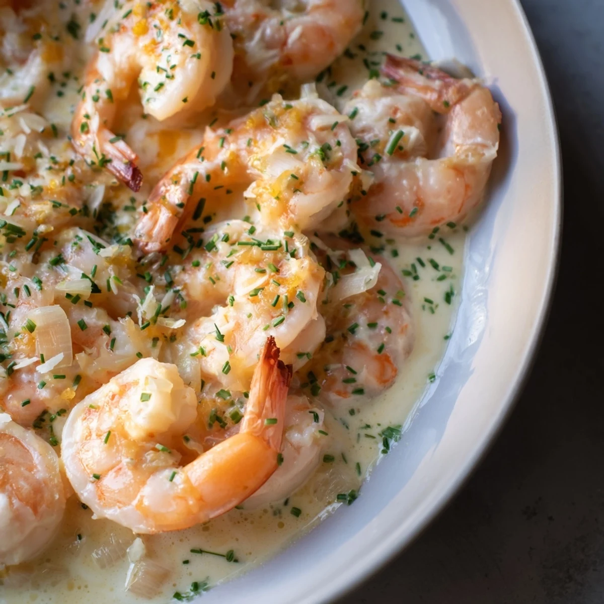 Close-up of the ultimate 20-minute creamy garlic shrimp: savory, tender shrimp in a rich cream sauce.