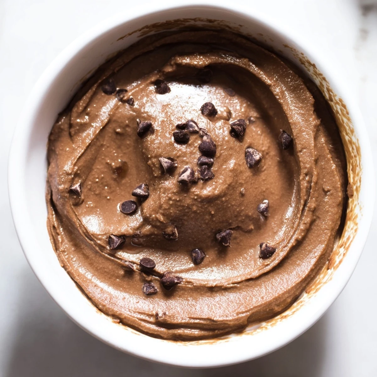 Delicious, vegan chocolate hummus, a sweet and healthy dip, ideal for a snack or dessert.