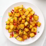 Diner-style air fryer breakfast potatoes, perfectly browned and flavorful, awaiting a delicious weekend brunch.