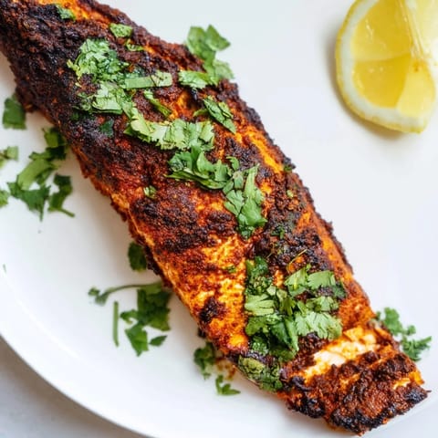 Enjoy flavorful, tender Indian tikka salmon, beautifully roasted and fragranced with authentic spices.